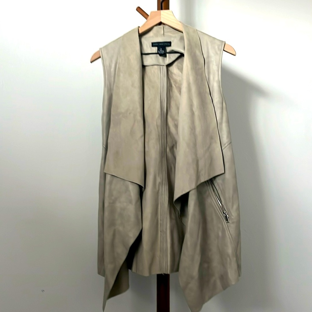 100%polyester/shell backing- taupe brown color sleeveless faux suede vest.
